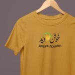Men's Mustard T-Shirt – “خوش آمدید ДОБРЕ ДОШЛИ” (Welcome) with Mango Graphic